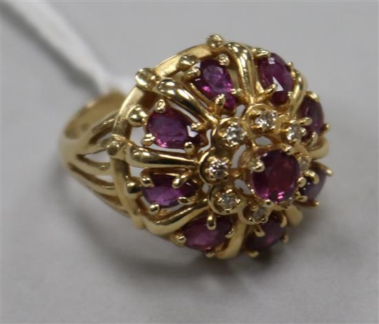 A 14ct gold, ruby & diamond cluster dress ring, size L.